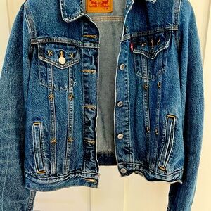 Denim jacket with star embellishments